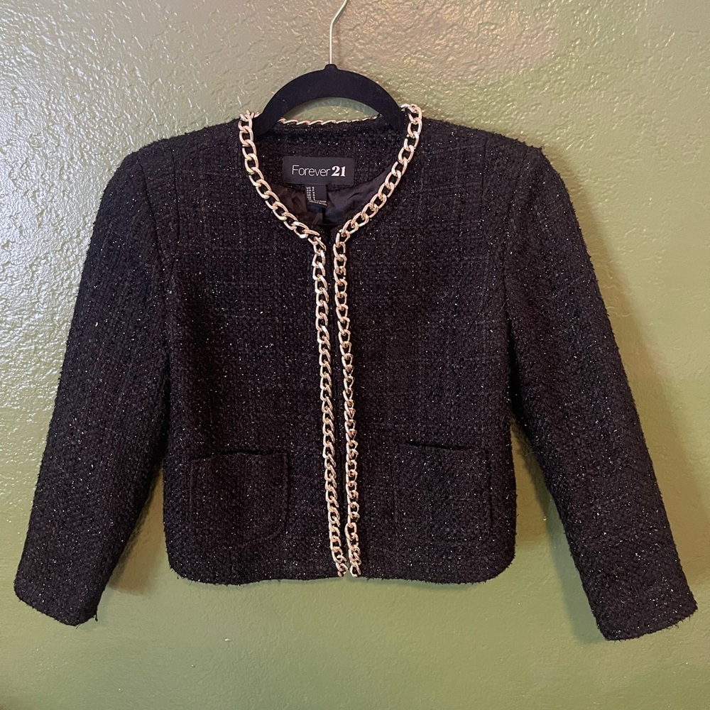 black shiny cropped jacket